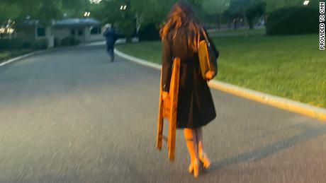 Correspondent OAN Chanel Rion saw a chair being transported on White House grounds