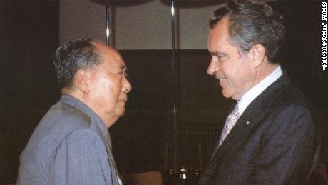 Chinese Communist President Mao Zedong welcomes American President Richard Nixon to his home in Beijing during Nixon's historic trip to China in 1972.