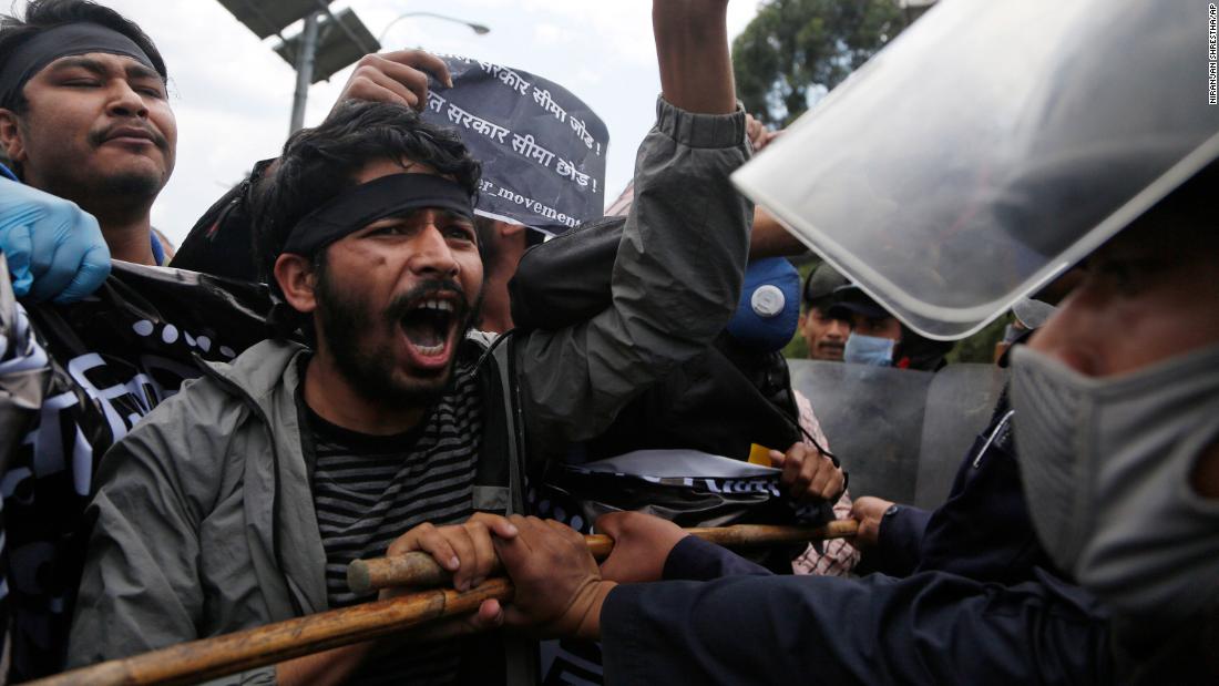 Nepalese protesters stage a demonstration on Saturday, May 9 during lockdown in Kathmandu, against a new link road to Lipulekh, a disputed territory between India and Nepal.