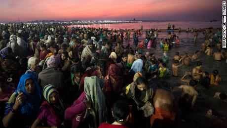 Hindus dive into Prayagraj, where the Ganges, Yamuna and Sarasvati rivers converge.