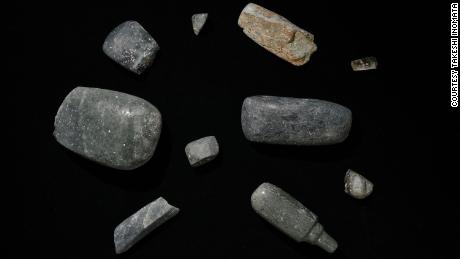 Axes excavated from the site, which date back to 1,000-700 BC. Other precious objects have also been found.