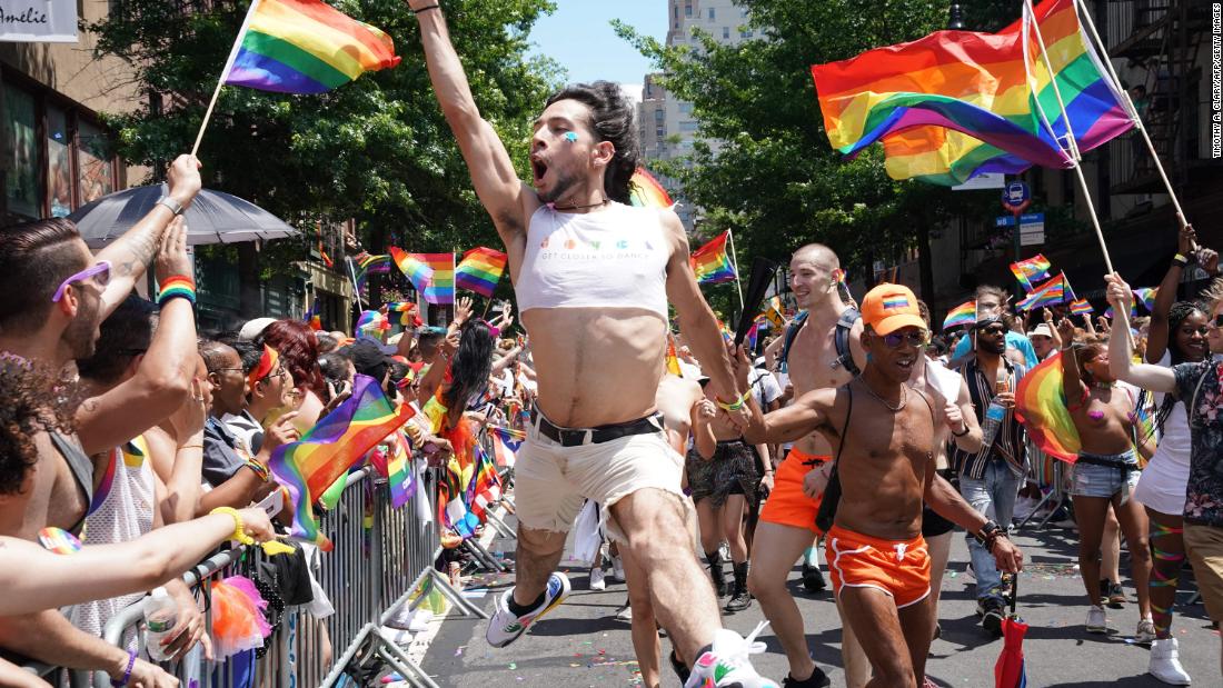 Participants take part in the NYC Pride March as part of WorldPride&#39;s commemoration of the 50th anniversary of the Stonewall riots, on June 30, 2019.