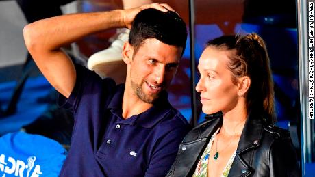 Serbian tennis player Novak Djokovic (L) talks to his wife Jelena during a match at the Adria Tour, Novak Djokovic&#39;s Balkans charity tennis tournament in Belgrade on June 14, 2020.