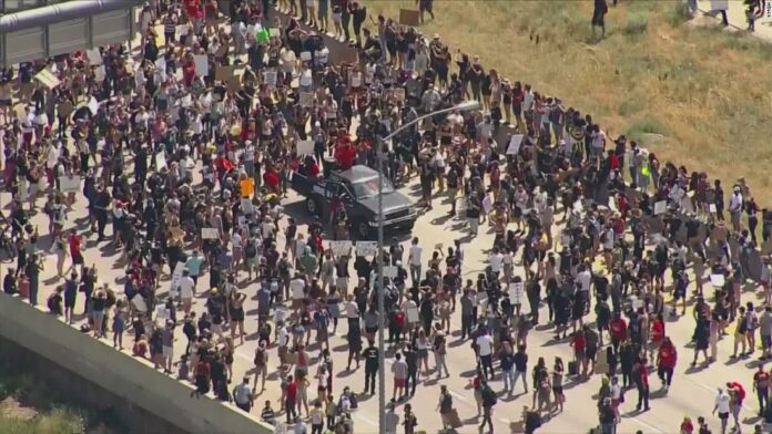 Elijah McClain: Colorado protesters shut down Highway 225