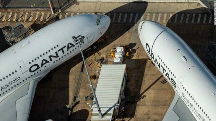 Qantas cuts 6,000 jobs and aims to raise $1.3 billion