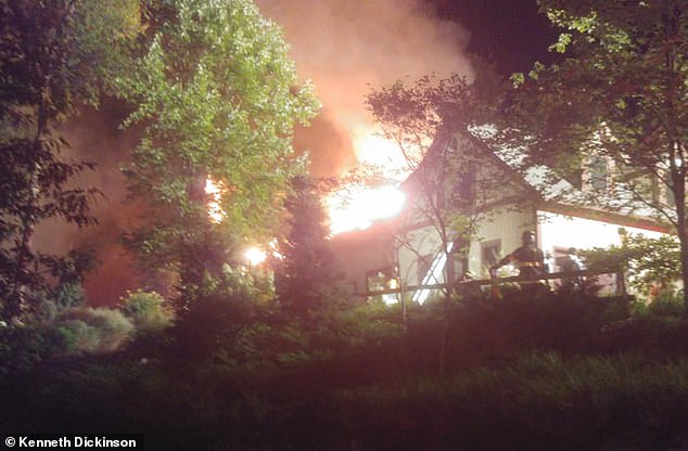 Photos posted online showed the home engulfed in flames with the roof on fire