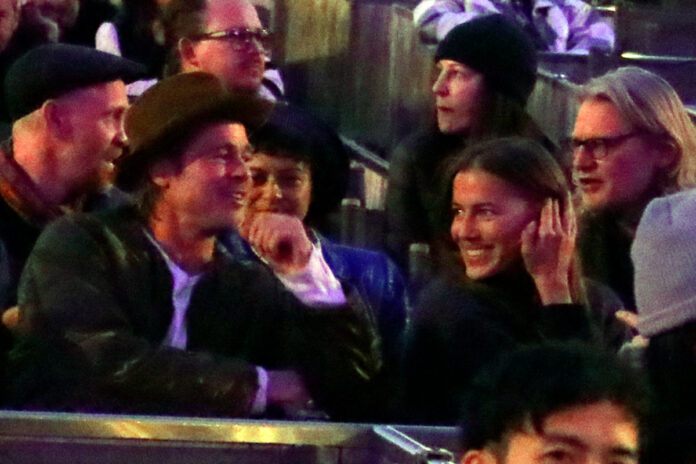 Brad Pitt and Nicole Poturalski attended Kanye West concert together in November