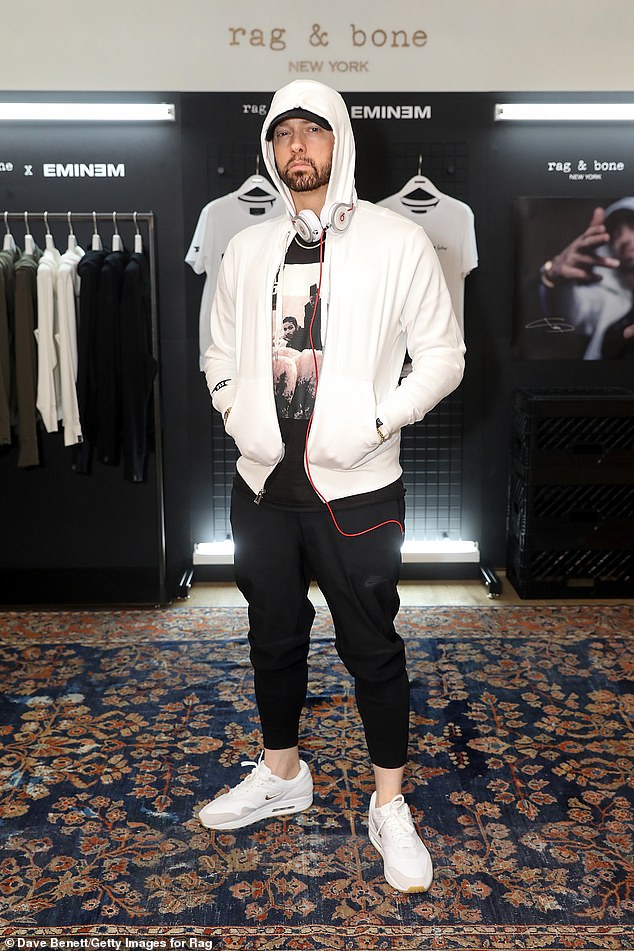 Eminem (pictured above in 2018) encountered an intruder at his home in Detroit in April, then the man retreated from the rapper's safety and smashed a window to gain entry.