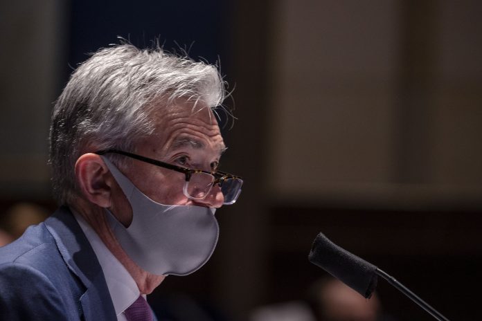 Federal Reserve Chairman Jerome Powell, wearing a face mask, testifies before the House of Representatives Financial Services Committee during a hearing on oversight of the Treasury Department and Federal Reserve response to the outbreak of the coronavirus disease (COVID-19), on Capitol Hill in Washington, U.S., June 30, 2020. Tasos Katopodis/Pool via REUTERS