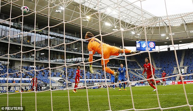 Oliver Baumann dives to his left but can do nothing to deny Joshua Kimmich in the 36th minute.