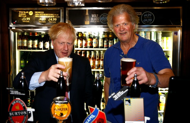 Boris Johnson and Tim Martin in Happy Times (Henry Nichols / PA)