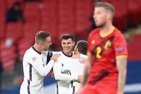 Mason celebrates his goal for England's victory over Mount Belgium