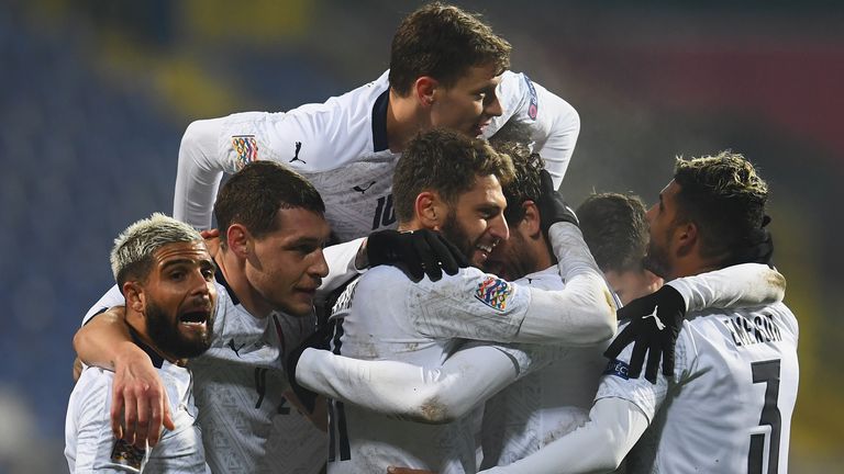 Domenico Berardi celebrates with teammates after Italy's second goal against Bosnia and Herzegovina