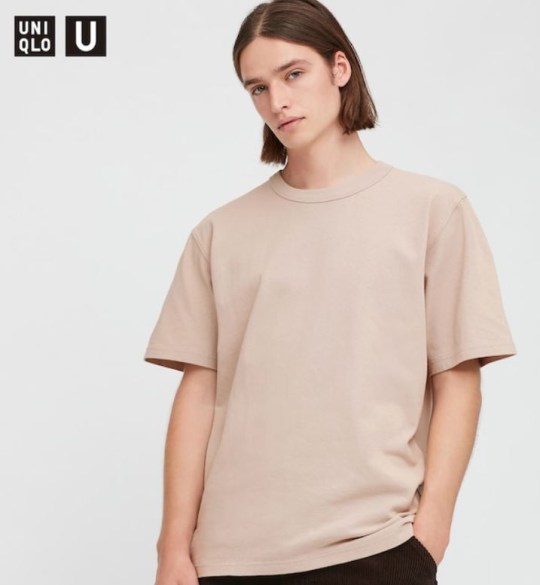 Model for Uniclo's gender neutral fashion wearing a tunnel t-shirt.