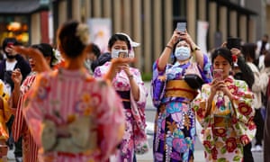 On the last day of a three-day holiday, kimono-clad holidays in Japan on November 23, 2020, take commemorative photos at Asakusa, downtown Tokyo, Japan.