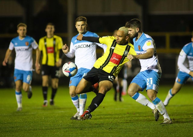 Brendan Kirnan of Harrogate Town under pressure from Brandon Fleming of Hull City.  ?  Picture: Matt Kirkham