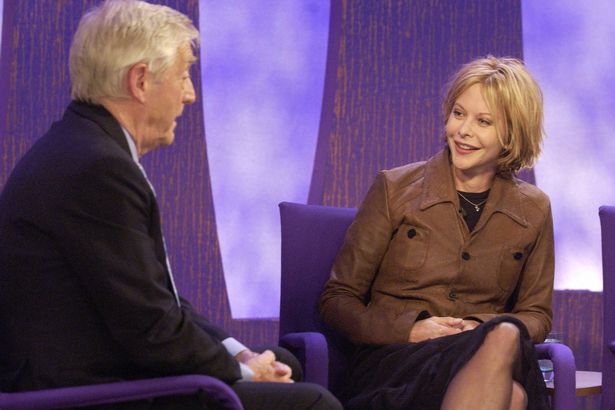 Michael Parkinson is talking to actress Meg Ryan