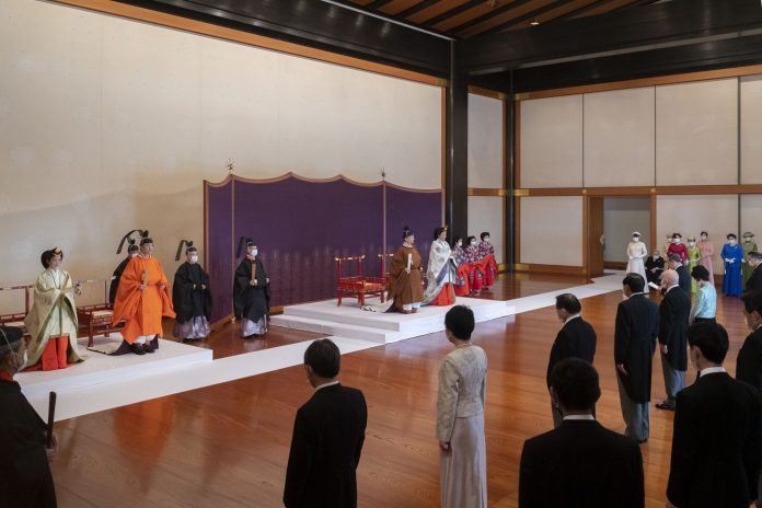 In this photo provided by the Imperial Household Agency of Japan, Japan's Crown Prince Akishino, second from left, flanked by his wife Crown Princess Kiko, left, attends a ceremony for formally proclaims Akishino is the first in line to the Chrysanthemum Throne with Emperor Naruhito, center left, and Empress Masako, center right, at the Imperial Palace in Tokyo, Sunday, Nov. 8, 2020. Akishisho, Naruhito's younger brother, was formally sworn in as first in line to the Chrysanthemum Throne in a traditional palace ritual that has been postponed for seven month and scaled down due to the coronavirus pandemic. (Imperial Household Agency of Japan via AP)