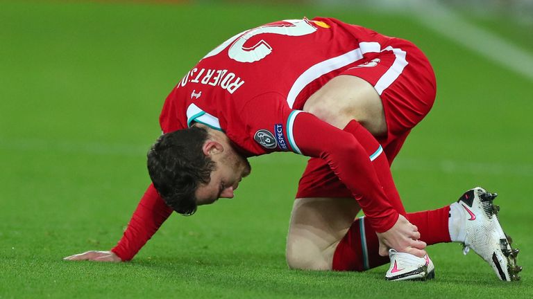 Andy Robertson suffered an injury scare against Ajax