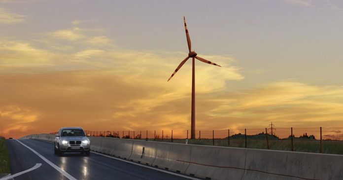 How many times does the wind turbine have to be turned for an electric car

