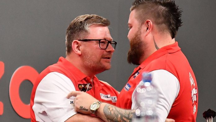 Darts World Cup: Favorites England and Scotland move on

