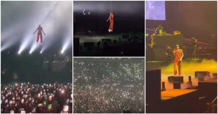Wizkid descends from the skies like a superhero as he makes a grand entrance in France, the crowd goes wild.

