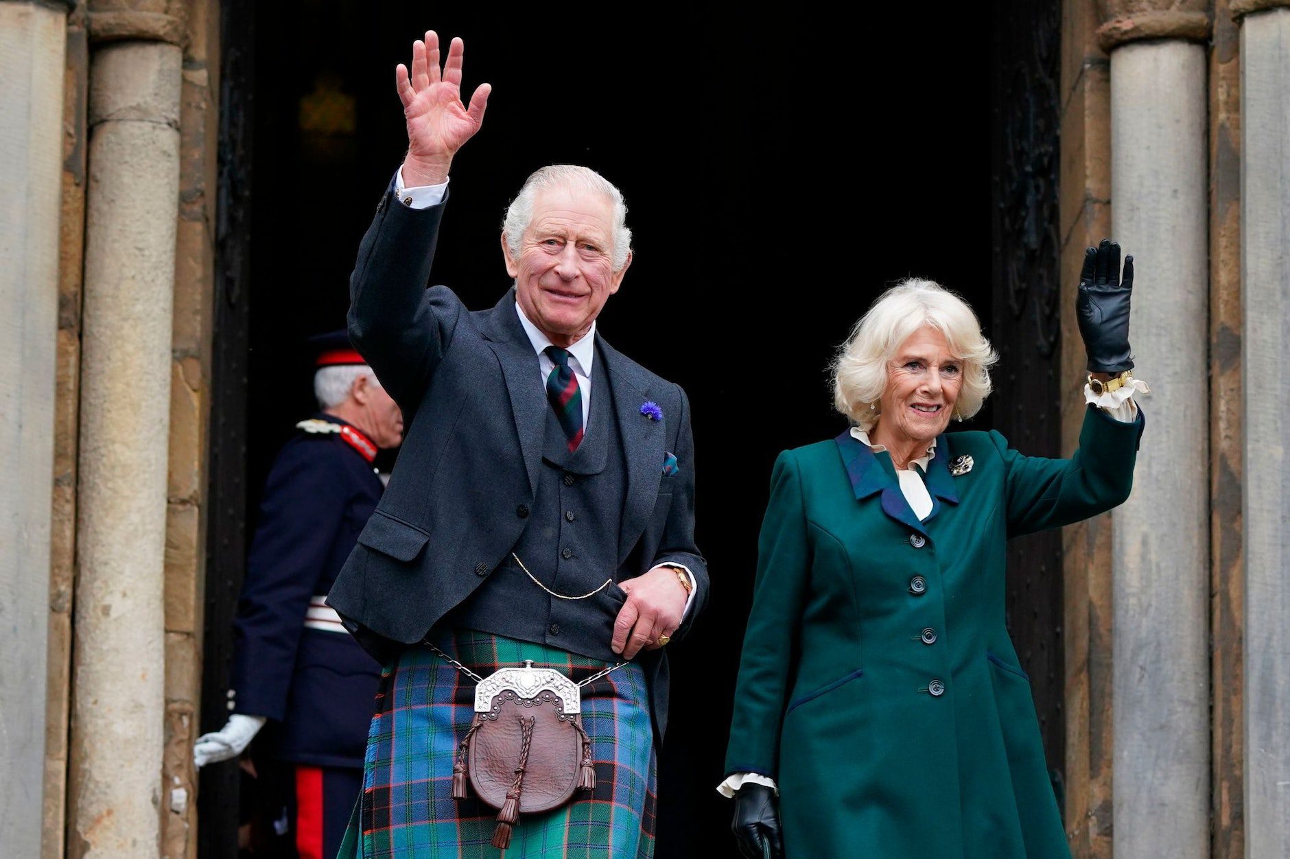 King Charles III and Queen Camilla leaving the abbey in Dunfermline, Scotland.  