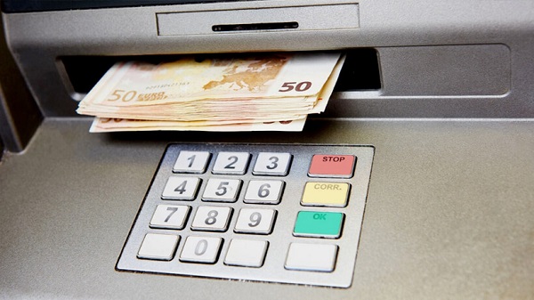 ATMs in Scotland dispense twice as much cash as required: chaos at the counter

