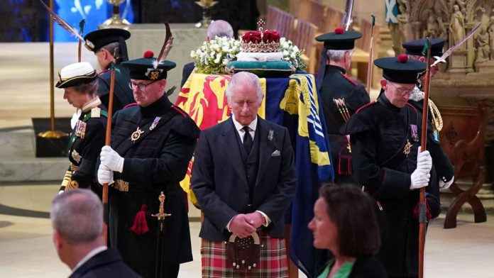 The Queen's coffin: King Charles and his siblings keep vigil

